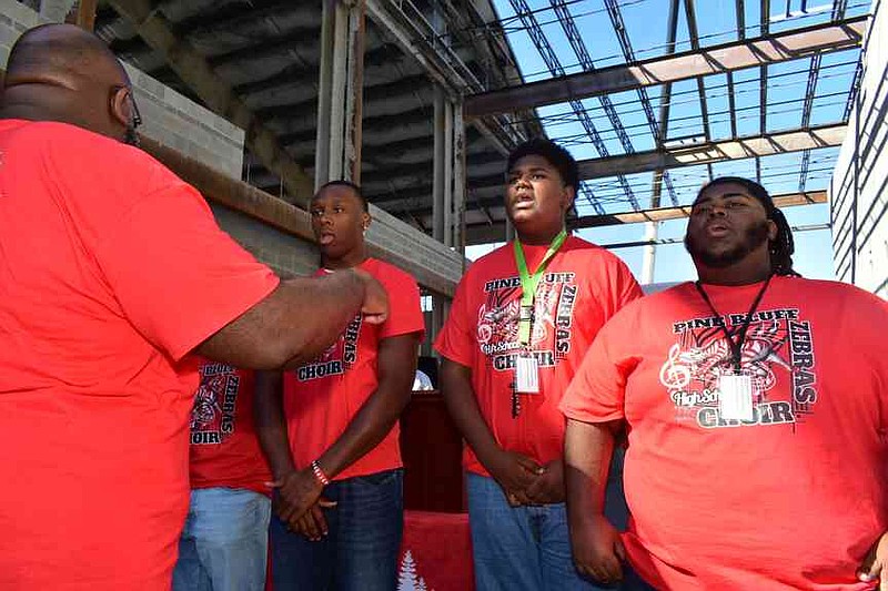 Pine Bluff High School Choir Ensemble members perform the alma mater as directed by Kourtney Smith. (Pine Bluff Commercial/I.C. Murrell)
