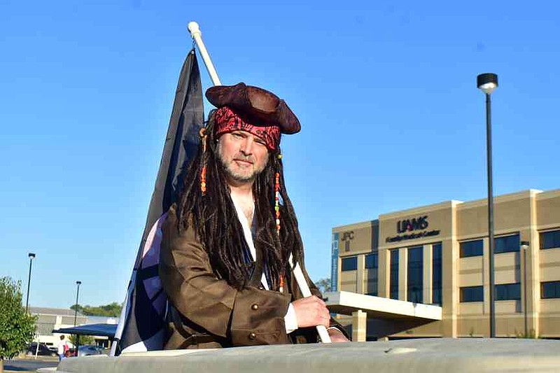 Wayne Harris, director of the Jefferson Regional Breast Center mammography department, is dressed as a pirate captain under the theme "Treasure Your Chest". (Pine Bluff Commercial/I.C. Murrell)