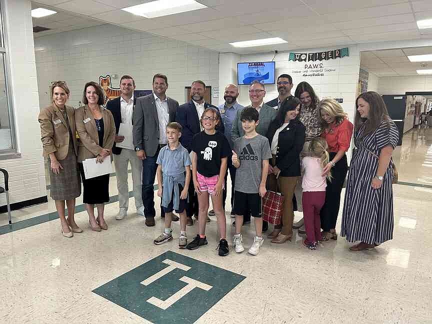 Bentonville School Board members, state legislators tour schools with ...