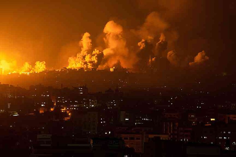 FILE.- Fire and smoke rise following an Israeli airstrike in Gaza City on Oct. 8, 2023. (AP Photo/Fatima Shbair,File)
