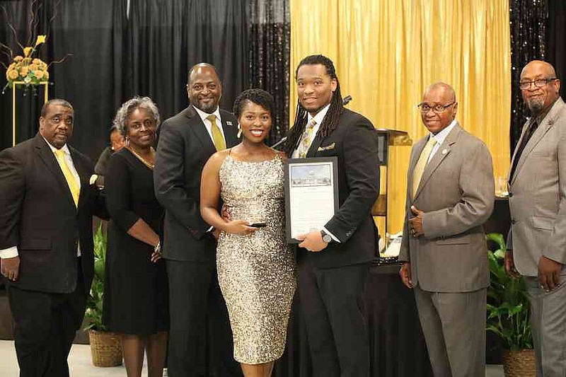 Tyquan and Angelica Walton of K & C Media received the business award. They were among honorees for their outstanding service. (Special to The Commercial/The Heat Magazine)