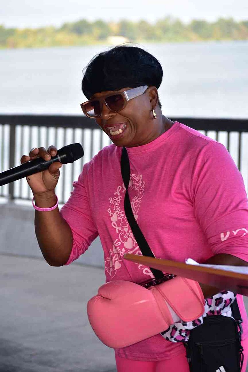 UAPB Athletics senior woman administrator Betty Hayes-Anthony wears a pink boxing glove symbolizing the fight against breast cancer. (Pine Bluff Commercial/I.C. Murrell)