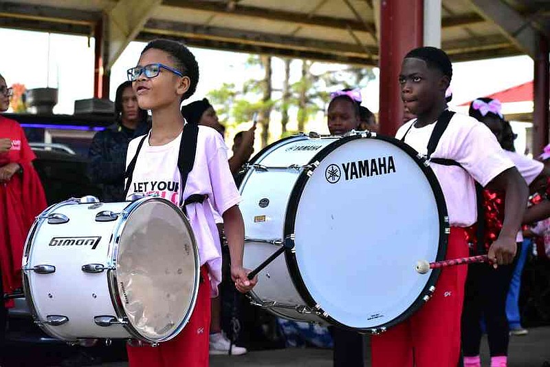 The Rhythm of the Drums drumline from 34th Avenue Elementary School performs outside the Saracen Pavilion. (Pine Bluff Commercial/I.C. Murrell)