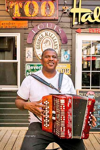 Mardi Gras comes early to Bridge Street with Dikki Du and the