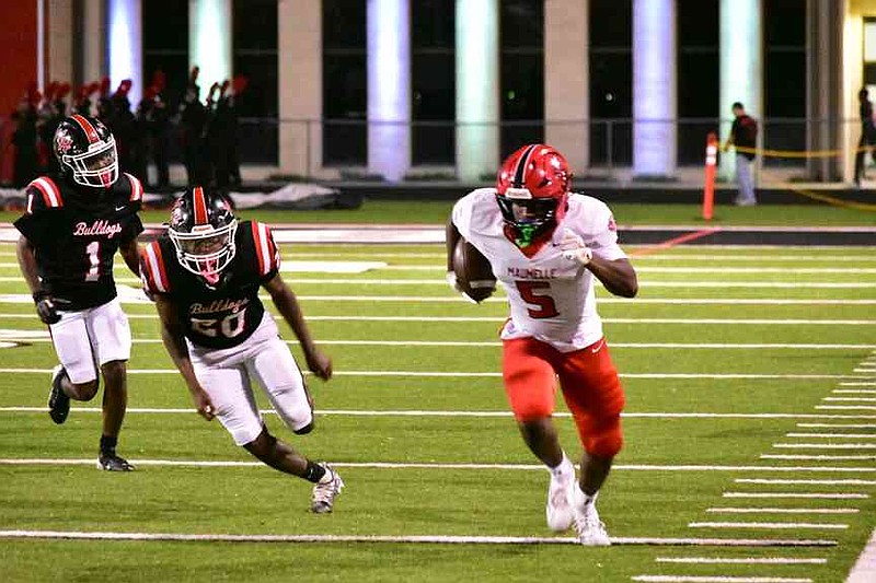 Jacob Henry (5) of Maumelle takes a hook-and-ladder play 60 yards for a touchdown as Bobby Foster (1) and Kyelin Craig (20) of White Hall chase him. (Pine Bluff Commercial/I.C. Murrell)