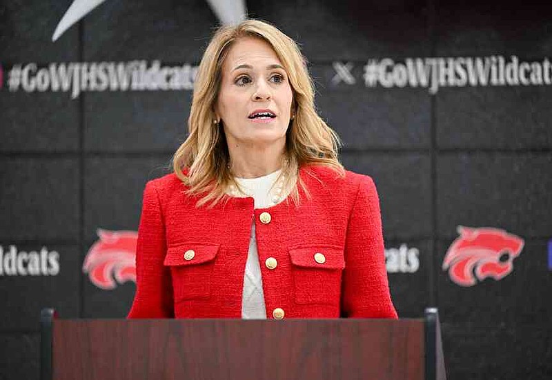Debbie Jones, superintendent of Bentonville Public Schools, speaks Tuesday during a ceremony announcing the school becoming the sixth parent-choice school in the Bentonville School District at the school in Bentonville. Each Bentonville parent-choice school has themed programming, such as arts or leadership development, that is integrated into the curriculum. Visit nwaonline.com/photo for today's photo gallery. (NWA Democrat-Gazette/Caleb Grieger)