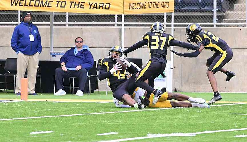 UAPB defensive end KJ Sims recovers the football after Southern muffed the opening kickoff. (Special to the Commercial/William Harvey)