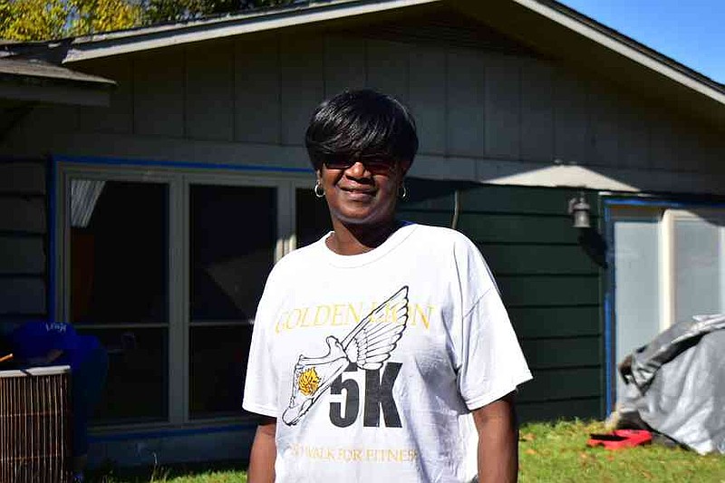 Army veteran Linda Johnson, pictured Wednesday, Nov. 5, 2025, purchased her home on Brentwood Drive in 1998. (Pine Bluff Commercial/I.C. Murrell)