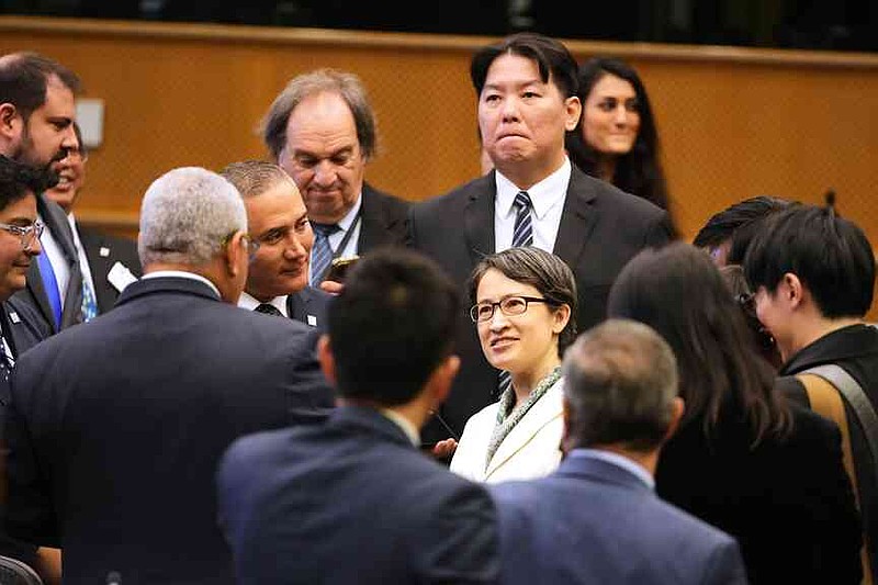 Taiwan’s Vice President Bi-Khim Hsiao, center, speaks with attendees after addressing at the European Parliament in Brussels, Friday, Nov. 7, 2025. (AP Photo/Virginia Mayo)