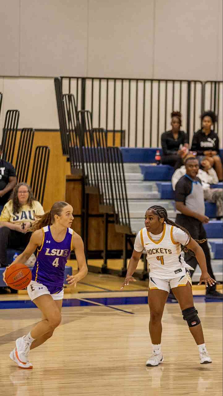 Freshman forward Marniyah Willis locks down on defense, shadowing the ball-handler from LSU-Eunice, freshman guard Paulina Reichenauer, during Saturday's championship game. (Pine Bluff Commercial/Eplunus Colvin)