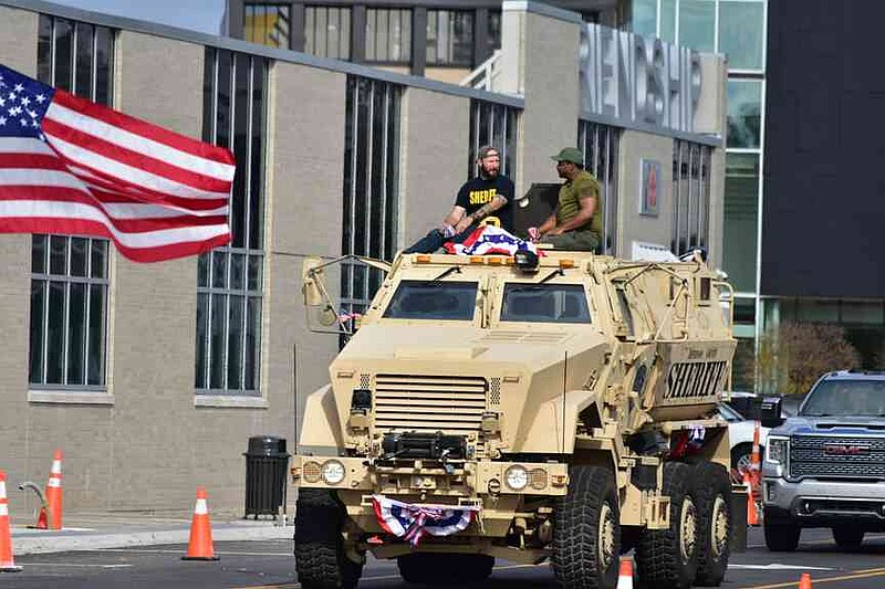 A Jefferson County sheriff's tank rolls down Main Street at the Pine Bluff Regional Veterans Parade on Saturday, Nov. 15, 2025. (Pine Bluff Commercial/I.C. Murrell)
