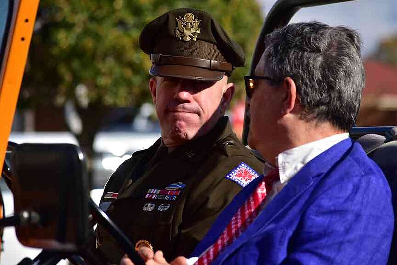 Brig. Gen. Olen "Chad" Bridges, left, of the Arkansas National Guard serves as one of two grand marshals for the Pine Bluff Regional Veterans Parade on Saturday, Nov. 15, 2025. (Pine Bluff Commercial/I.C. Murrell)