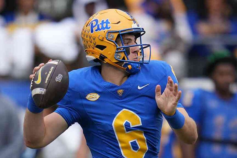 Pittsburgh quarterback Mason Heintschel (6) throws a pass during the first half of an NCAA college football game against Notre Dame in Pittsburgh, Saturday, Nov. 15, 2025. (AP Photo/Gene J. Puskar)