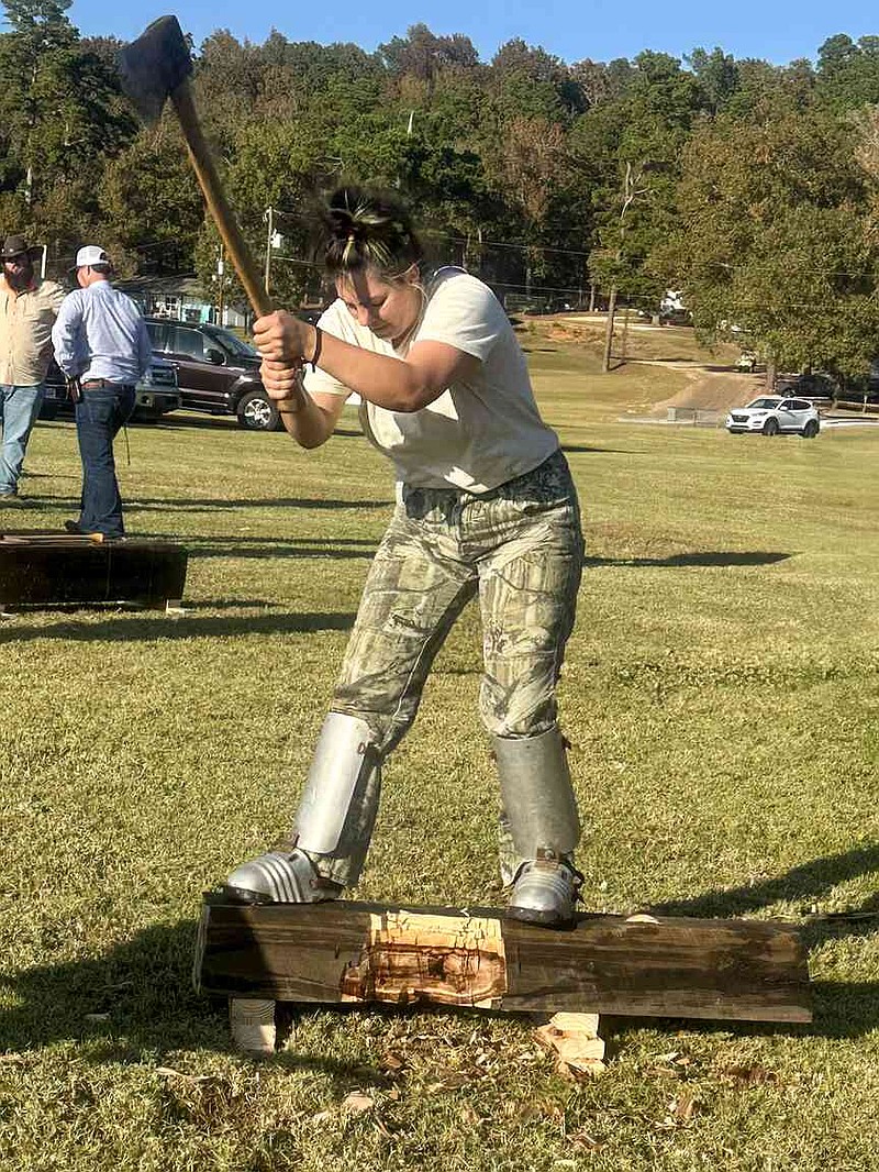 Hannah Hopson of El Dorado competes in the women's underhand chop. Hopson is a member of the University of Arkansas at Monticello Forestry Club. (Special to The Commercial/University of Arkansas System Division of Agriculture)