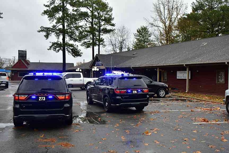 Police units are parked outside Sissy's Log Cabin on South Camden Road on Thursday, Nov. 20, 2025. (Pine Bluff Commercial/I.C. Murrell)