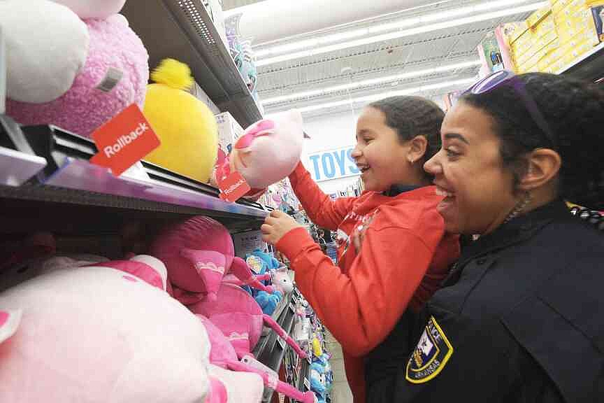 Northwest Arkansas law enforcement officers will soon spend time shopping with children