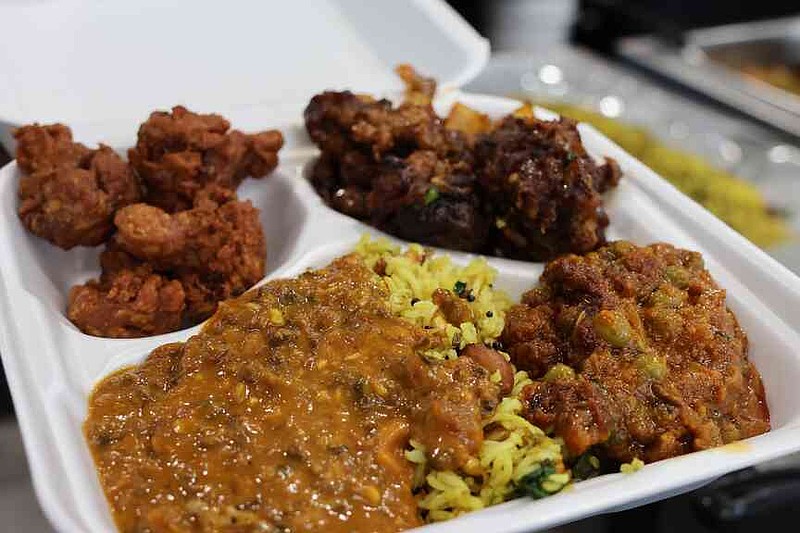 There are plenty of options for vegans and vegetarians like the chili mushroom, fried cauliflower, and Aloo Mutter, and Dal Makhani over lemon rice. (Special to The Commercial/Deborah Horn)