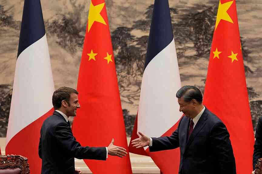 France’s president arrives in Beijing