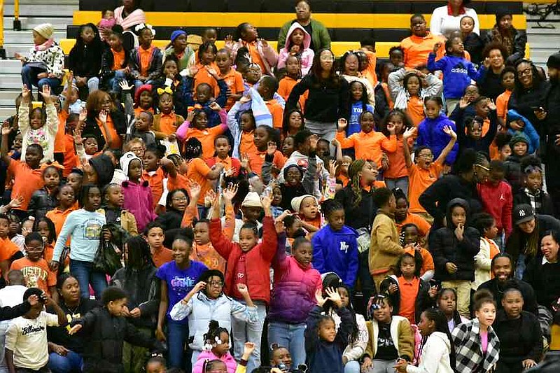 Local elementary school students cheer on UAPB during Future Golden Lions Kids Club Day against Arkansas Baptist. (Pine Bluff Commercial/I.C. Murrell)