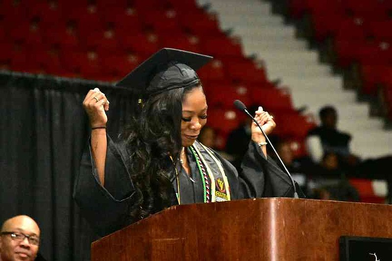 Mari'Neisha Hardrick of Memphis delivers student reflections during the University of Arkansas at Pine Bluff fall commencement Saturday, Dec. 13, 2025. (Pine Bluff Commercial/I.C. Murrell)