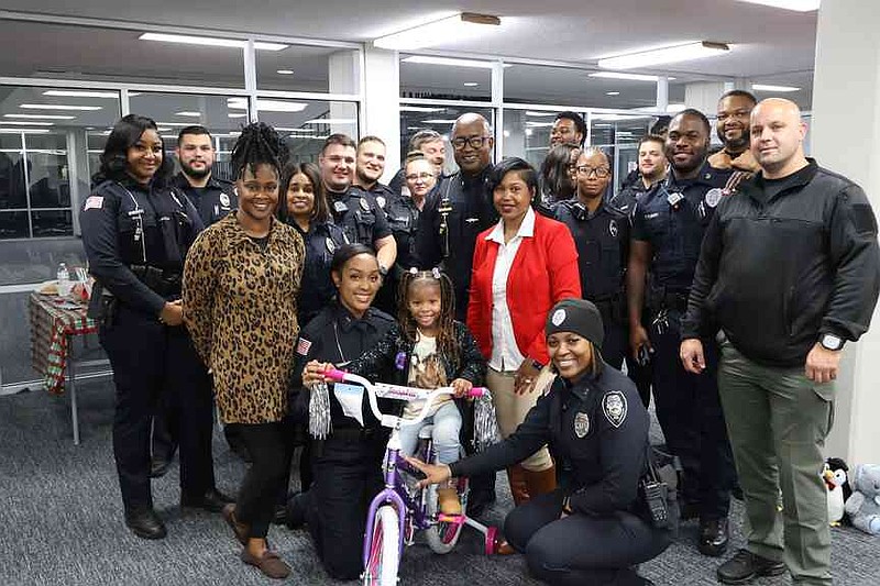 In addition to a shopping spree at the Walmart Supercenter, children who took part in the Pine Bluff Fraternal Order of Police's Fourth Annual Shop with a Cop event, held Friday Dec. 12, 2025, were also awarded brand new bicycles. (Special to The Commercial/Pine Bluff Police Department)