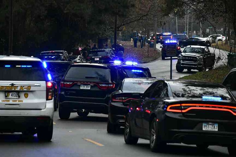 Police and sheriff's units block off both lanes of South Cherry Street following a standoff at the home of former radio personality Will Jenkins on Wednesday, Dec. 17, 2025. (Pine Bluff Commercial/I.C. Murrell)
