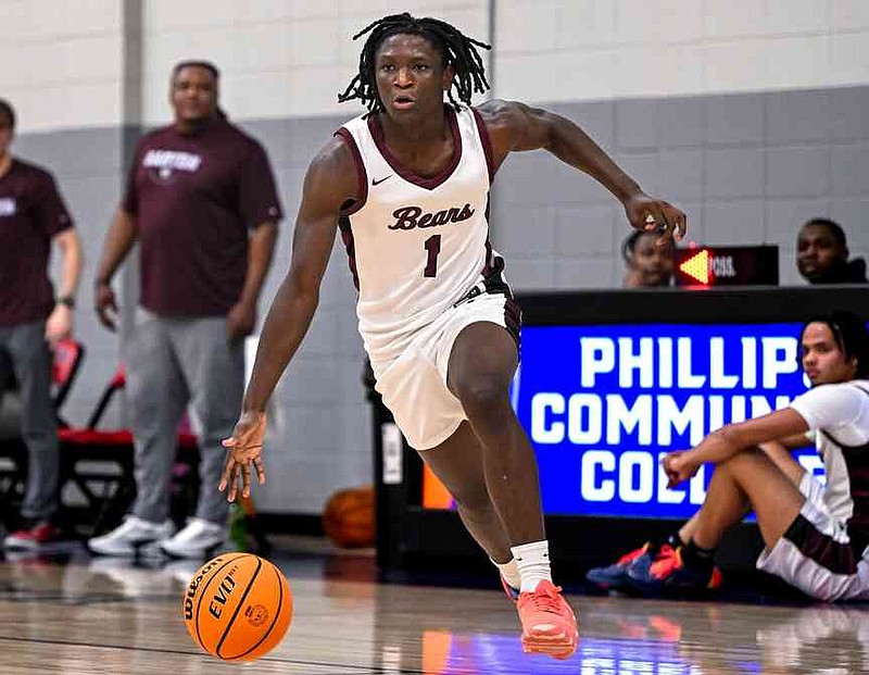 Christian Williams of Barton dribbles in transition during a game at Phillips Community College of the University of Arkansas earlier this season. (Special to The Commercial/Cam'Nem Images)