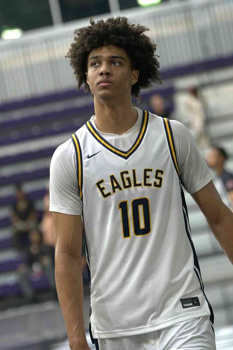 Gallagher Placide of Faith Family Academy in Dallas is pictured in a game earlier this season. (Special to The Commercial/Arthur Kimber)