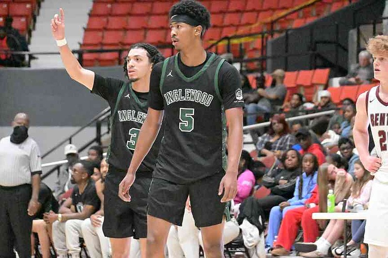 Matthew Martinez (3) and Jason Crowe Jr. (5) of Inglewood set up a play against Benton during the second half of a King Cotton Holiday Classic game at the Pine Bluff Convention Center on Saturday, Dec. 27, 2025. (Pine Bluff Commercial/I.C. Murrell)