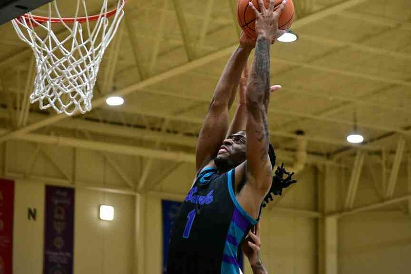 Amir Rosa of Southeast Arkansas College dunks the basketball against Phillips Community College of the University of Arkansas in the first half Wednesday, Jan. 7, 2026, at H.O. Clemmons Arena. (Pine Bluff Commercial/I.C. Murrell)