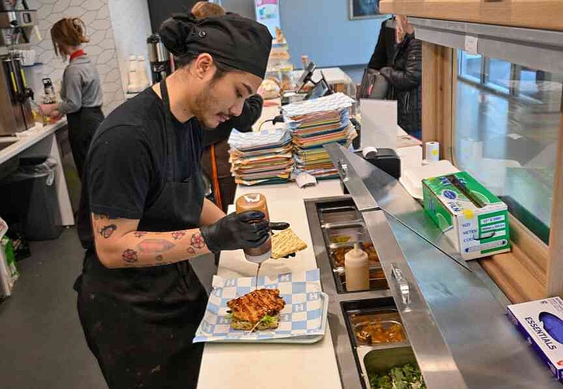 Handshakes Menu Handshake opens at the Fayetteville Public Library, offering chicken ...