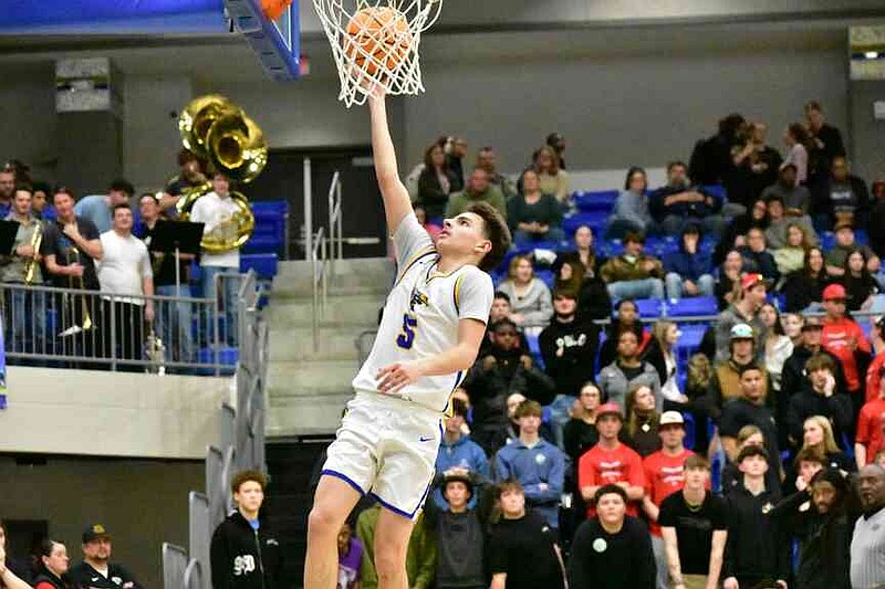 Jace Gatlin of Sheridan goes up for a layup against White Hall in the second quarter on Friday, Jan. 16, 2026, at Yellowjacket Arena in Sheridan. (Pine Bluff Commercial/I.C. Murrell)