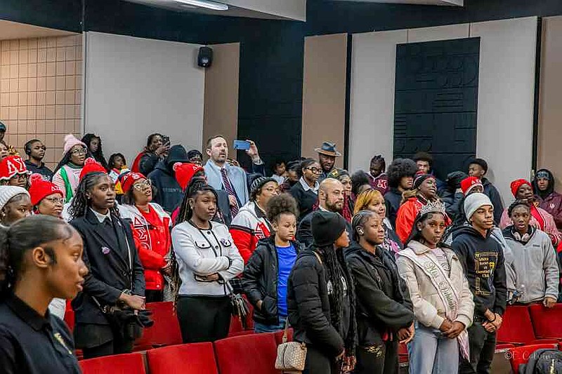 KingFest program attendees sing 'Lift Every Voice and Sing', also known as the Black National Anthem. (Pine Bluff Commercial/Eplunus Colvin)