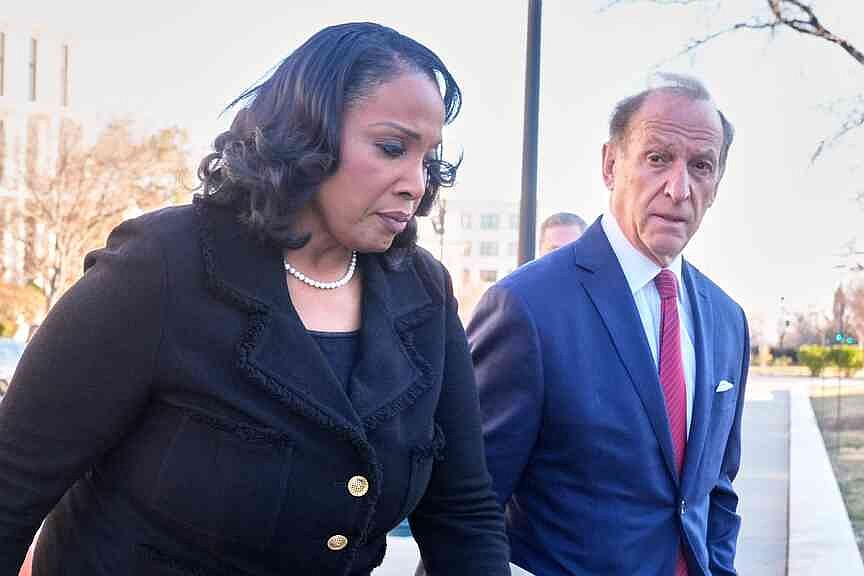 Justices hear of effort to fire Cook