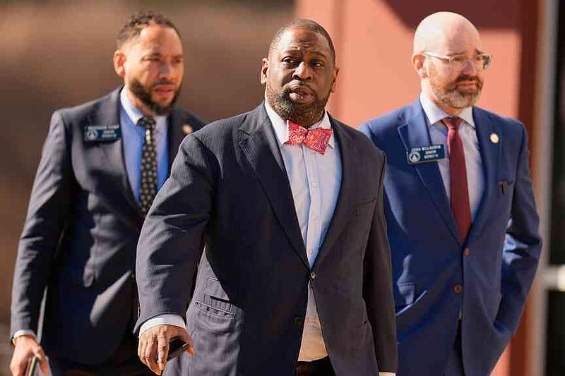 Fulton County Commissioner Marvin S. Arrington, Jr., walks with other elected officials, Wednesday, Jan. 28, 2026, in Union City, Ga., near Atlanta, as FBI agents search at the Fulton County Election Hub and Operation Center. (AP Photo/Mike Stewart)