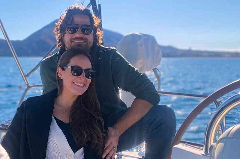 This undated photo provided by shows Sabrina Morley shows Sabrina Morley and Steven Devereaux in Spain. (Sabrina Morley via AP)