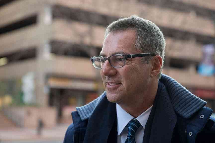 Law firm chairman named in released Epstein emails resigns position