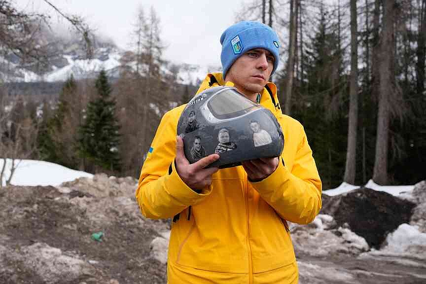 Ukrainian disqualified over helmet honoring war dead