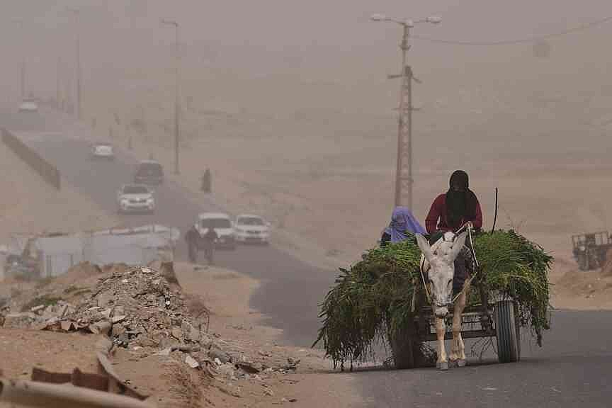 Aid group suspends Gaza efforts after armed breach