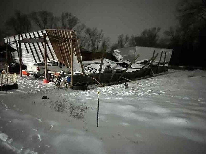 A collapsed farm shop in Yell County was one of many structures damaged or destroyed during the Jan. 23-27 winter storm that covered most of Arkansas and surrounding states. (Special to The Commercial/Bobby Powell/University of Arkansas System Division of Agriculture)
