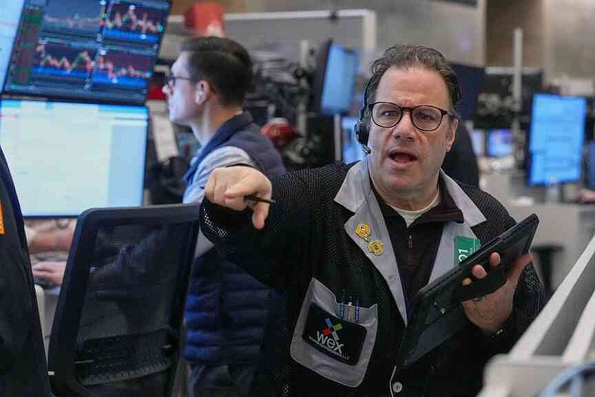 Quiet finish for stocks hides big market swings