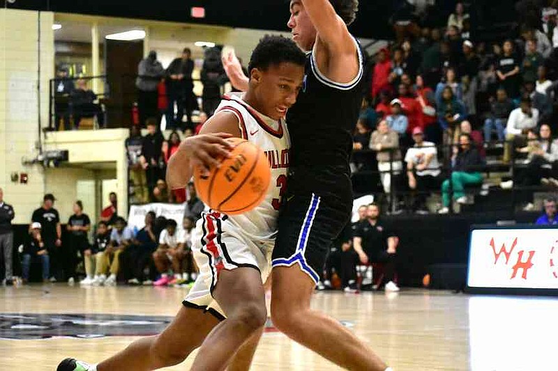 Arian Bateman, left, of White Hall runs into Beckett Scott of Sheridan in the first quarter Tuesday, Feb. 17, 2026, at Bert Honey Gymnasium in White Hall. (Pine Bluff Commercial/I.C. Murrell)