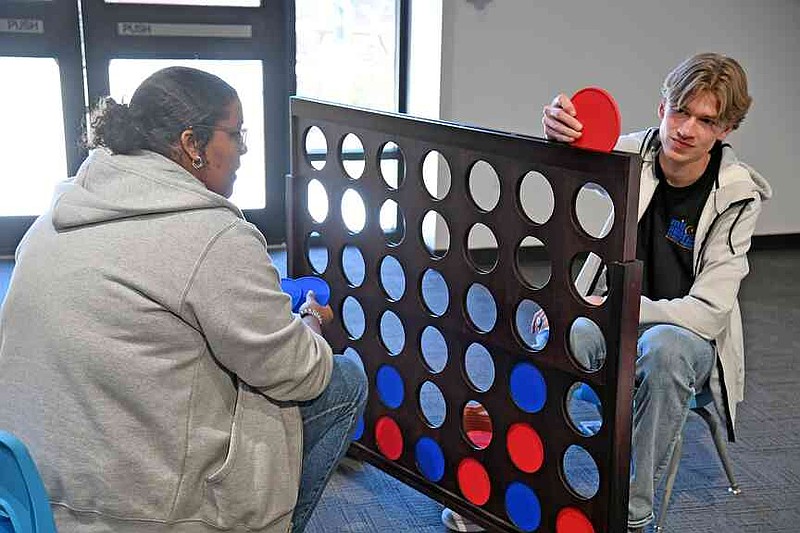 Mid-America Science Museum staff play a giant game of Connect 4 in the Hall of Wonder on March 2, 2024, which was part of The Family Room exhibit. (The Sentinel-Record/File)