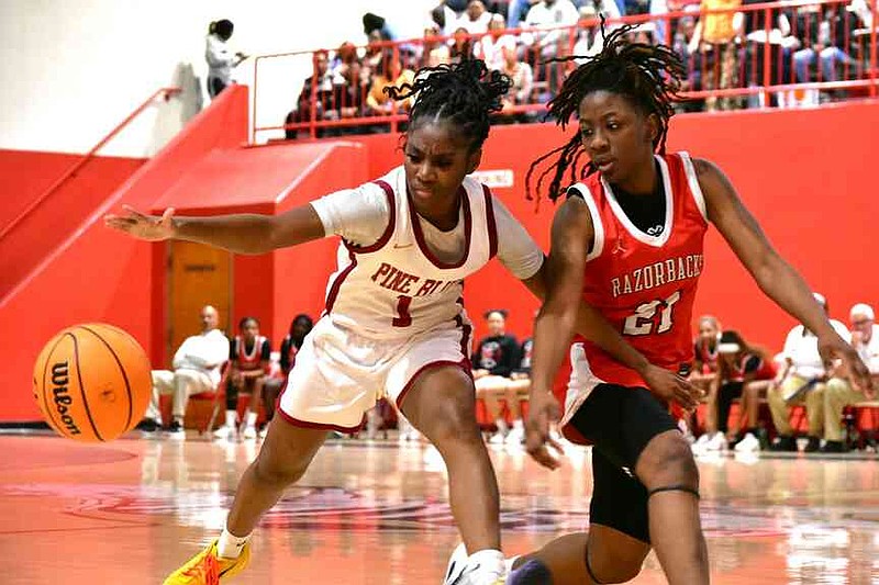 Adrianna McAfee of Pine Bluff and Cheyenne Ellison of Texarkana chase down a loose ball in the second half Friday, Feb. 2, 2026, at the Jack Robey campus. (Pine Bluff Commercial/I.C. Murrell)