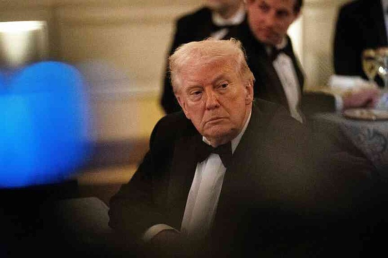 President Donald Trump attends the National Governors Association dinner at the White House, Saturday, Feb. 21, 2026, in Washington. (AP Photo/Allison Robbert)