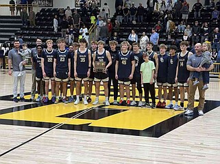 Shiloh Christian's boys captured the Class 4A Region 1 Tournament championship Saturday night with a 56-47 victory over Ozark at Prairie Grove. (NWA Democrat-Gazette/Henry Apple)