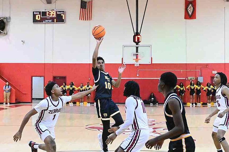 Watson Chapel junior Jayden Moody shoots a jumper during a Nov. 11, 2025, boys basketball game at Pine Bluff. (Special to the Commercial/William Harvey)