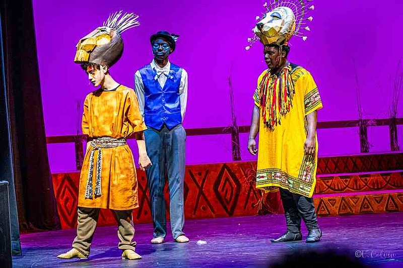 Zazu keeps a watchful eye as Scar is confronted by Mufasa. (Pine Bluff Commercial/Eplunus Colvin)
