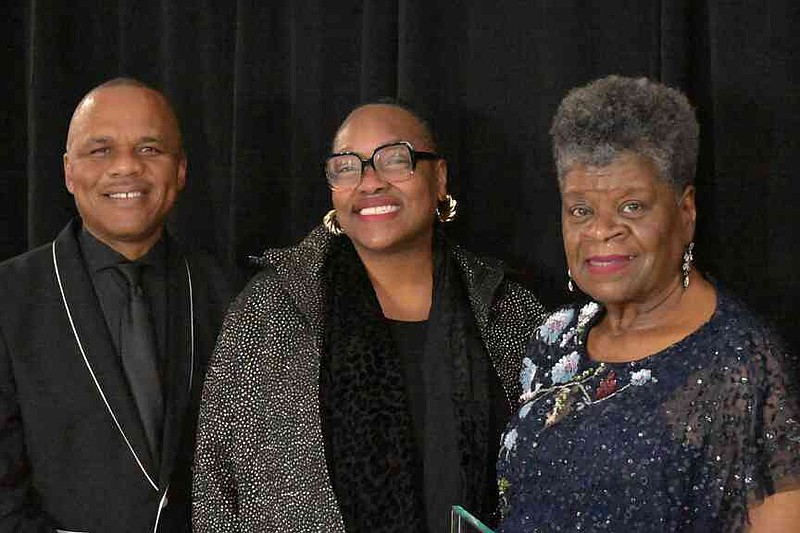 Southeast Arkansas College President Tyrone Jackson and Pine Bluff Mayor Vivian Flowers poses with Dr. Martha Flowers, one of the honorees at A Night of Black Excellence. (Pine Bluff Commercial/I.C. Murrell)