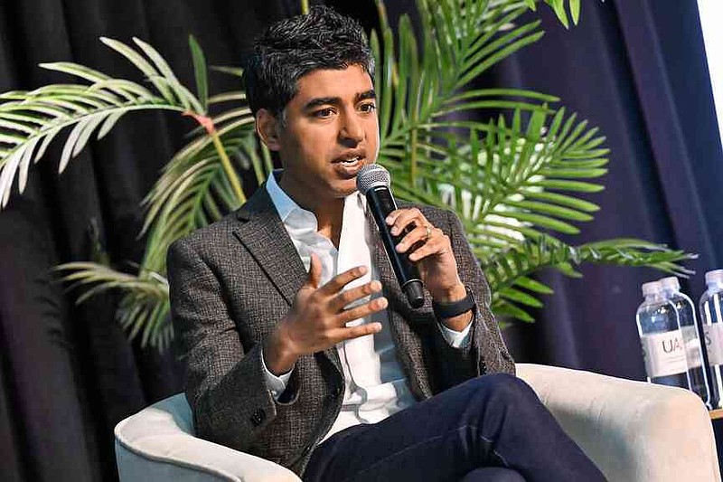 Keynote speaker Dr. Neal Shah, chief medical officer of Maven Clinic, speaks Thursday during the Northwest Arkansas Health Summit at Fayetteville Town Center. Attendees of the Northwest Arkansas Health Summit heard from a variety of speakers to learn about strategies for improving health care throughout the state.  Visit nwaonline.com/photo for today's photo gallery.  (NWA Democrat-Gazette/Caleb Grieger)